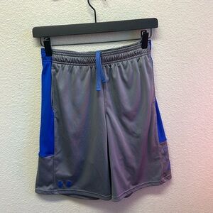 Under Armour loose fit youth basketball shorts.